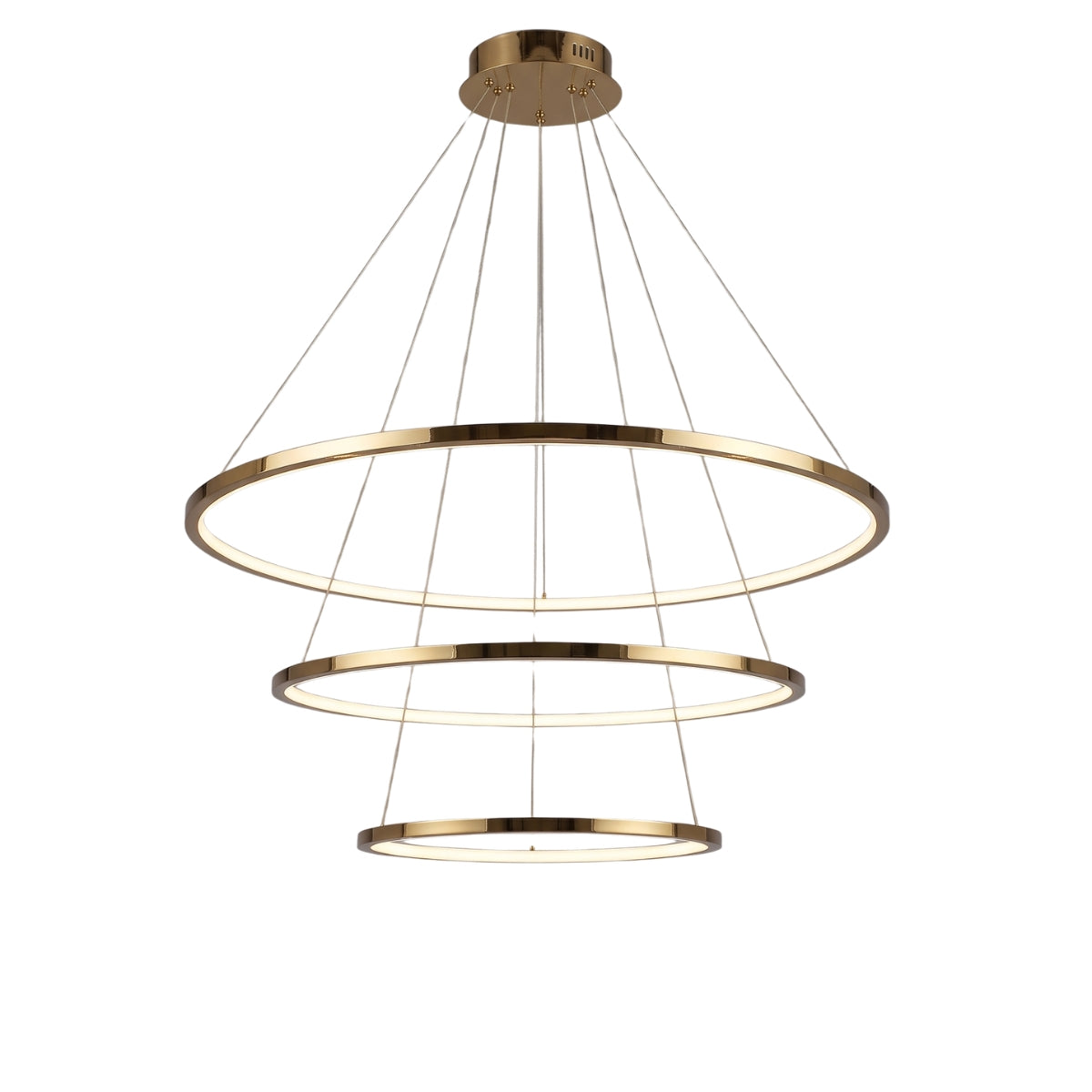 A modern three-tier circular ring LED pendant light fixture in a brushed gold finish, suspended by thin cables from a matching circular ceiling canopy against a solid white background.