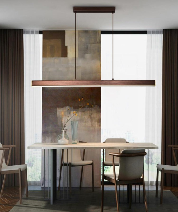 Sleek modern LED ceiling light illuminating a contemporary dining area with a wooden table.