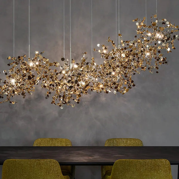 High-quality stainless steel Aurora chandelier with G9 light sources, available in Golden and Chrome finishes. Perfect for living rooms, dining rooms, bedrooms, villas, and lobbies, this versatile design blends luxury and functionality for a brilliant and inviting ambiance.