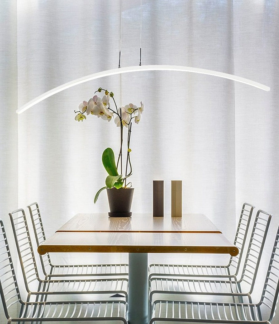 Modern LED pendant light with a curved design,.